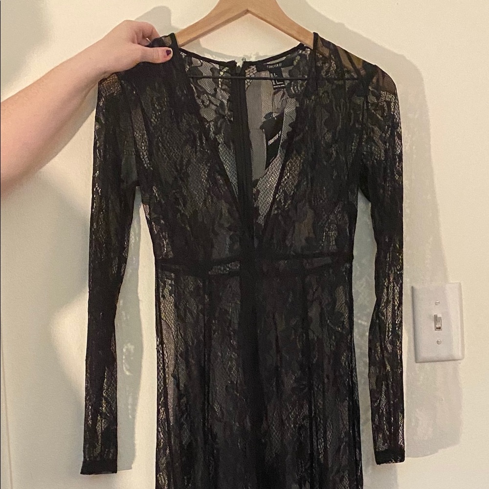 See through lace floor length dress. Size S